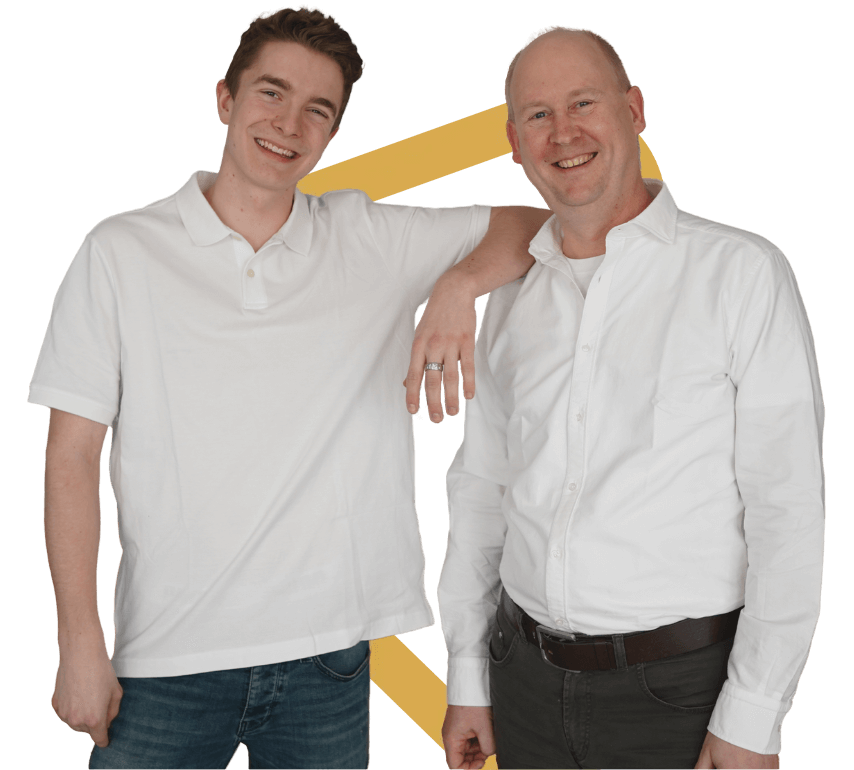Team-Porträt von zwei Mitarbeitern der Praxis Voigt Dental, freundlich lächelnd in weißer Arbeitskleidung.
